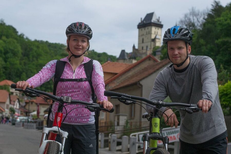 E-Bike Day Trip: Visit a Roman Castle and Taste Craft Beer - Karlstejn Castle after the river ride