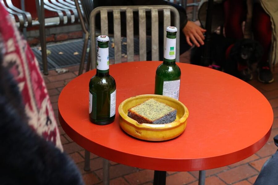 Eating Berlin: City Center Food & Beer Tour - Boulette and flammkuchen bring regional flavor