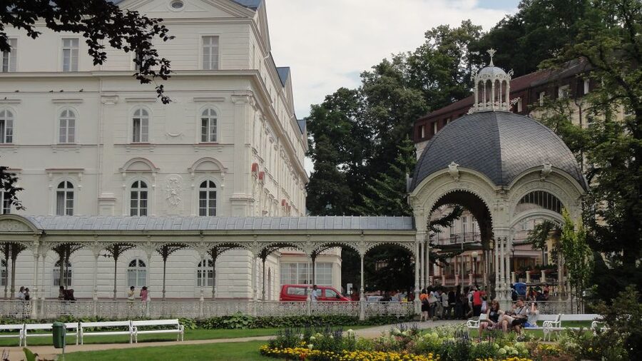 From Prague: Private Karlovy Vary & Crystal Factory Tour - The Thermal Hotel pool and a warmer kind of pause
