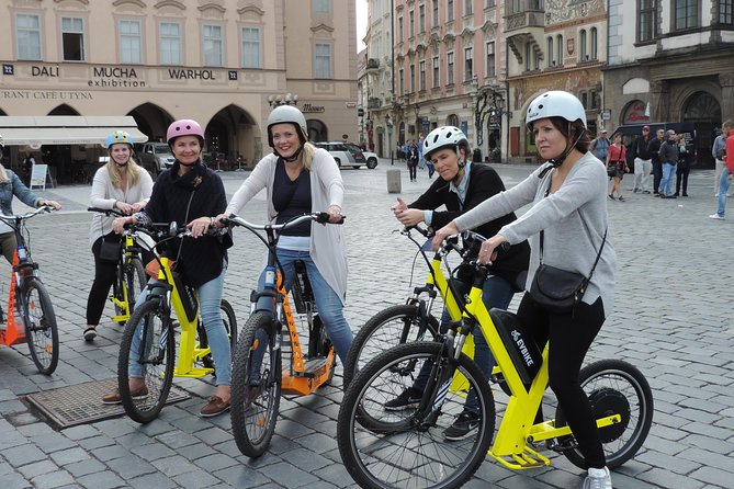Grand City Tour of Prague on Cruiser e-Bikes or e-Scooters - Kampa Park, the Lennon Wall, and Charles Bridge