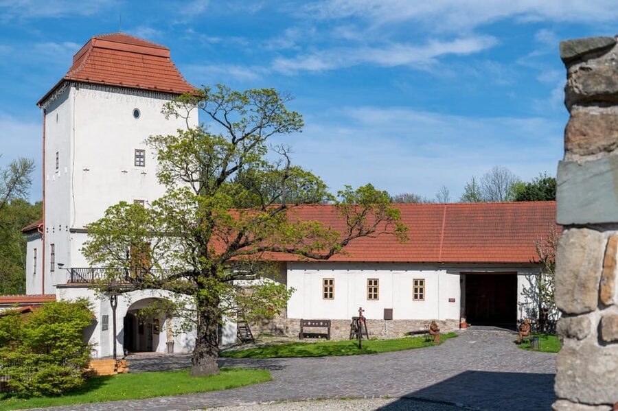 Ostrava: Entrance to Silesian Ostrava Castle - A Green Pause Beside the Amphitheater