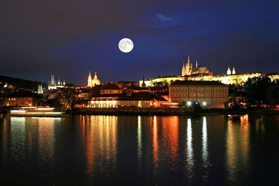 Panoramic Views of Prague Evening Walking Tour - Crossing Charles Bridge toward the castle