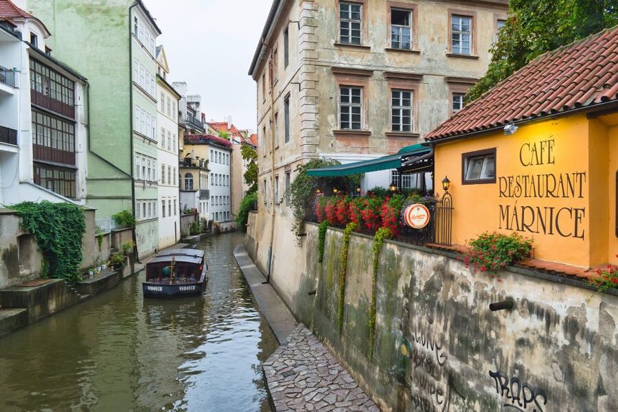 Prague: 1.5-Hour River Boat Cruise and Guided Tour - Boarding below Charles Bridge