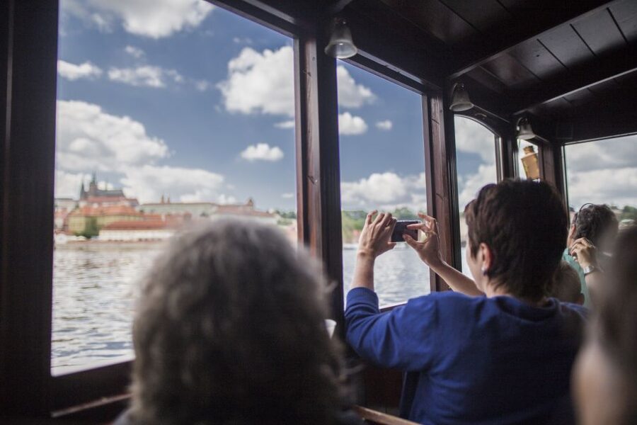Prague: 3–Hour Castle Grounds Walking Tour and River Cruise - Taking the tram up to Prague Castle
