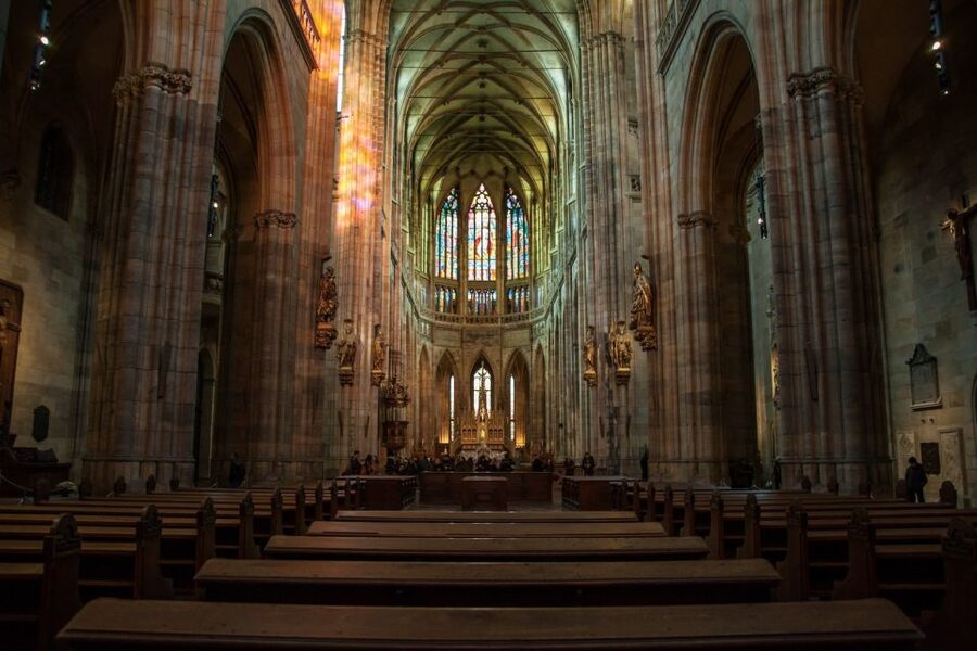 Prague: 3-Hour Old Town and Prague Castle Tour in German - Clementinum and the road to Charles Bridge