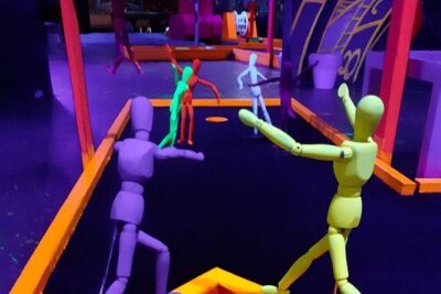 Prague Black Light Mini Golf and Games with free Drinks