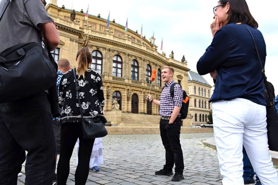 Prague: Castle and Jewish Quarter Tour with Cruise and Lunch - Riding the tram toward Europe’s largest castle complex