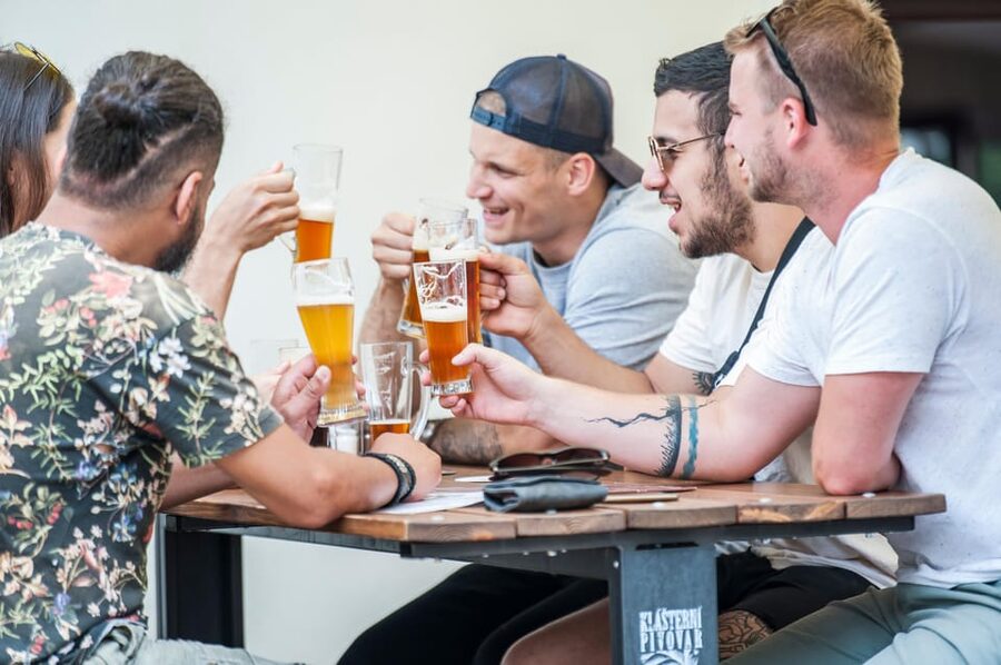 Prague: Castle Side Breweries & Pubs Guided Walking Tour - Taking the tram uphill toward Prague Castle
