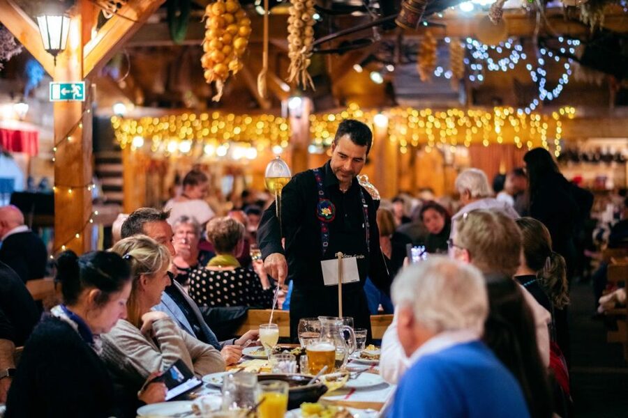 Prague: Evening Folklore Garden Party with Traditional Menu - Music, dancing, costumes, and games