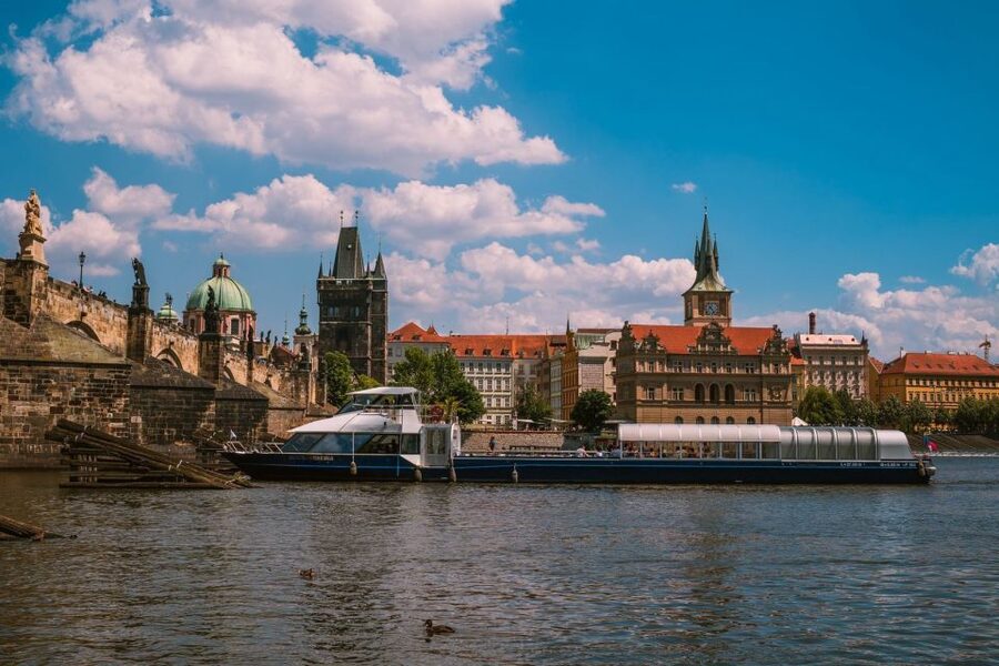 Prague: Evening Vltava River Eco Cruise with Prosecco - Under Charles Bridge, where the view changes