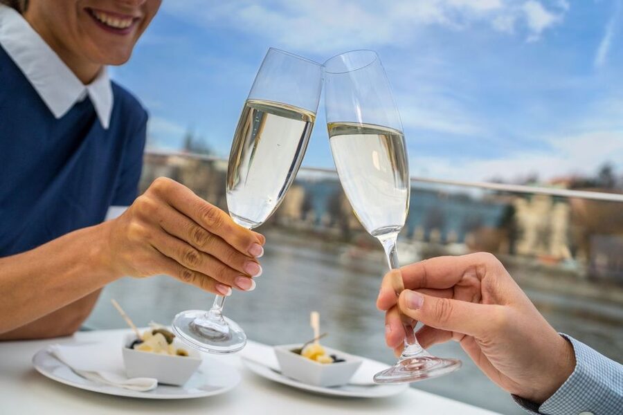 Prague: Evening Vltava River Eco Cruise with Prosecco - Prosecco, snacks, and the onboard service