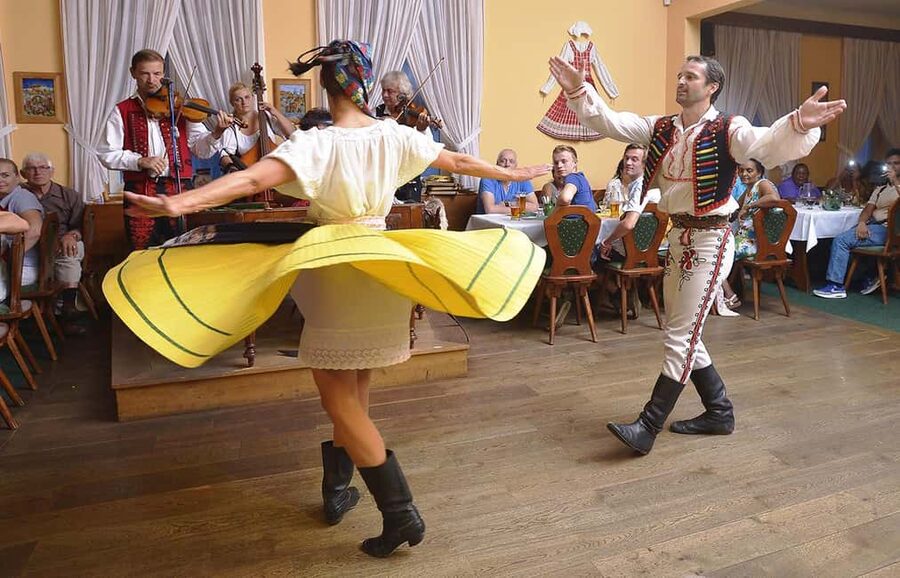 Prague: Folk Dancing Dinner Experience - Entering the decorated restaurant