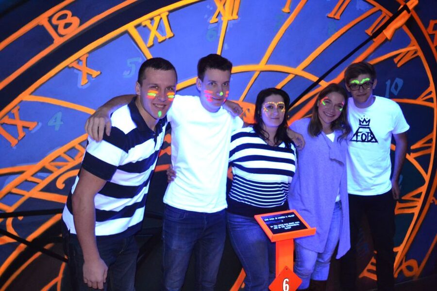 Prague: Glow Golf Mini Golf Game by UV Light - Prague Murals Instead of Generic Neon Decor