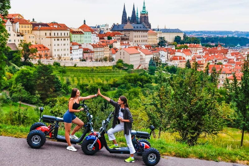 Prague: Guided Sightseeing Tour by Electric Trike - Down toward the Lennon Wall and Charles Bridge