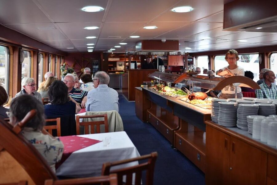 Prague: Lunch Cruise on Vltava River with open Buffet - Commentary, atmosphere, and the experience level