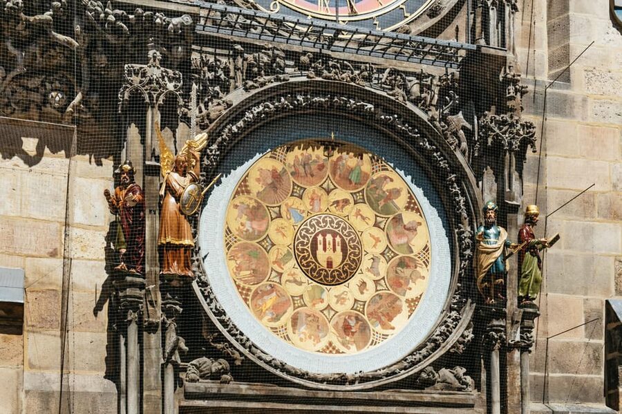 Prague: Old Town, Astronomical Clock and Underground Tour - Crossing Charles Bridge with stories attached