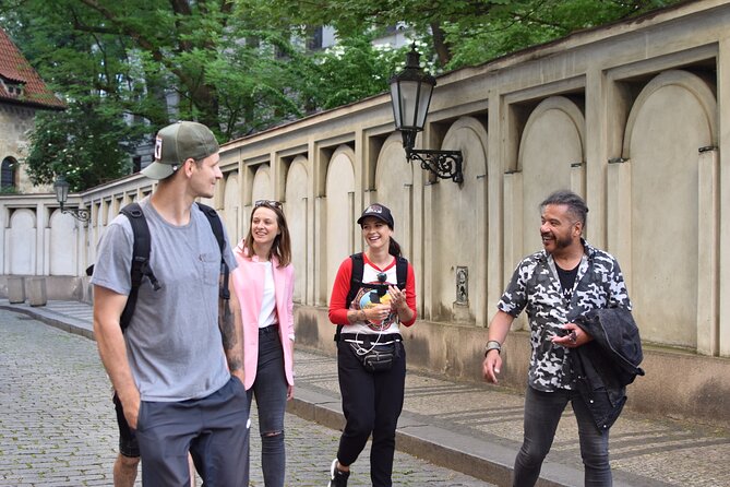 Prague Old Town Highlights & Hidden Gems Tour with PragueWay - Crossing Charles Bridge with a local guide