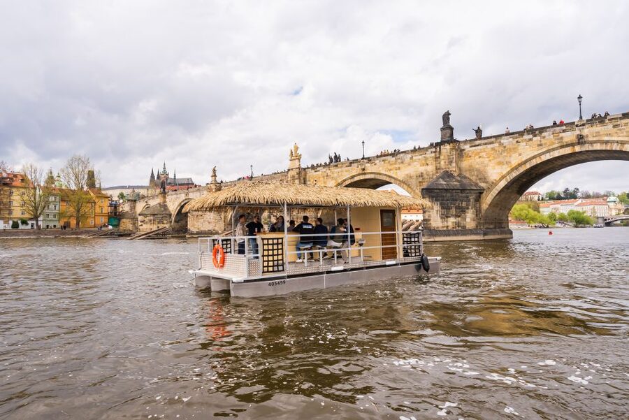 Prague: Party Tiki Boat Sightseeing Cruise with Drinks - The National Theater gives you the first city view