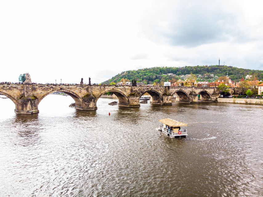 Prague: Party Tiki Boat Sightseeing Cruise with Drinks - Continuing toward Štvanice Island