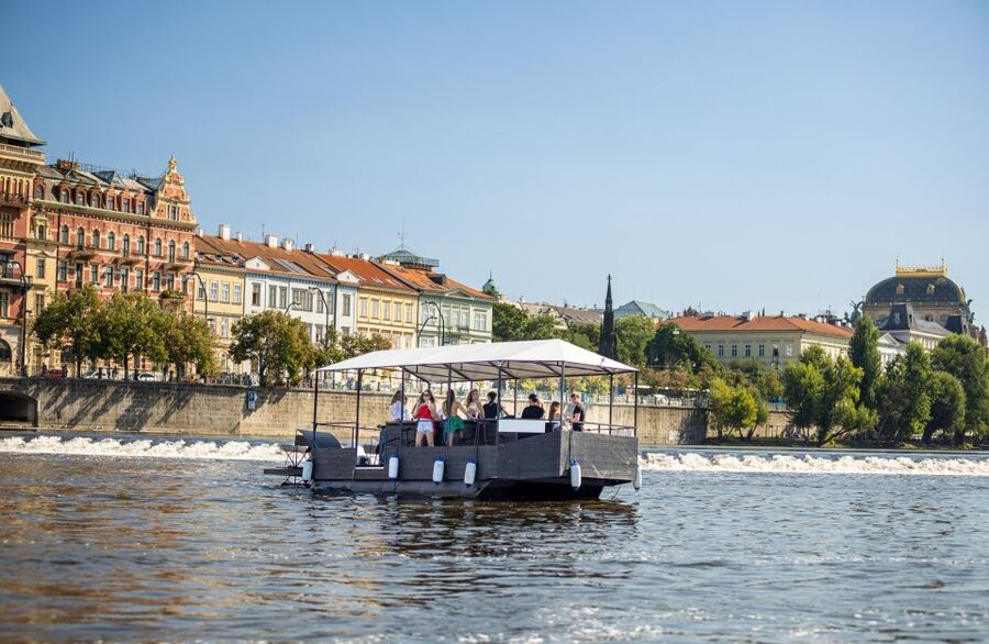 Prague: Private Cycle Boat River Tour with Beer or Prosecco - Finding the blue-roofed boat by the botel