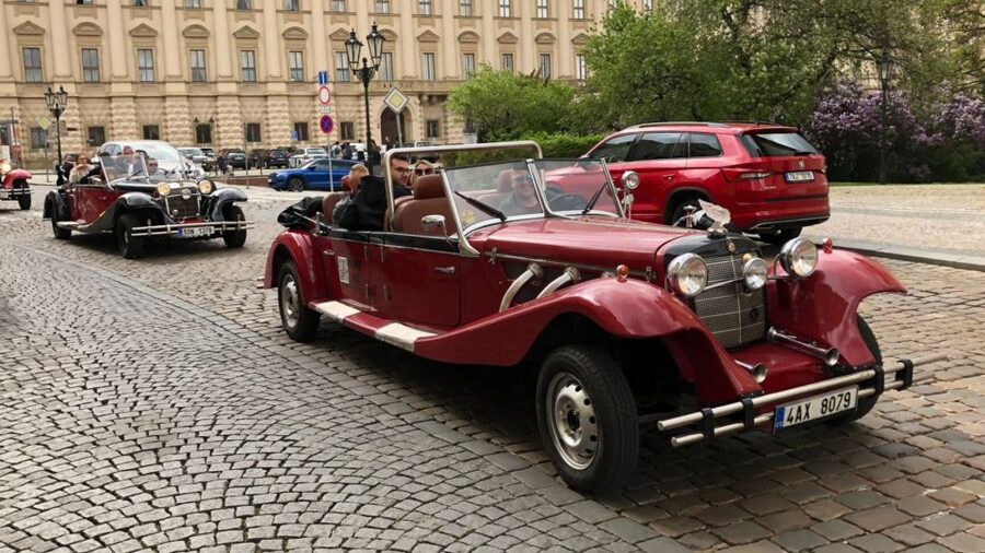 Prague: Private Tour by Vintage Car - The riverfront finish: Dancing House and National Theatre