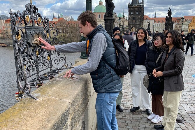 Prague’s TOP Sights - Old Town, Jewish Quarter, Charles Bridge (Tip-based tour) - Crossing Charles Bridge with the Vltava below