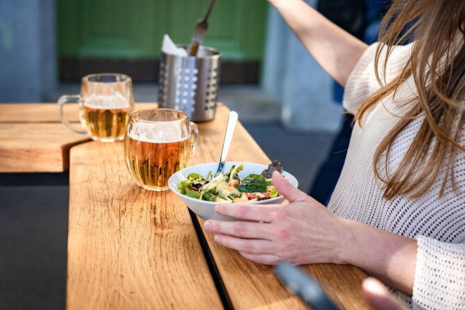 Prague Snack & Stroll: Private Food Tour with Your Local Buddy - Crossing Štvanická lávka toward Karlín