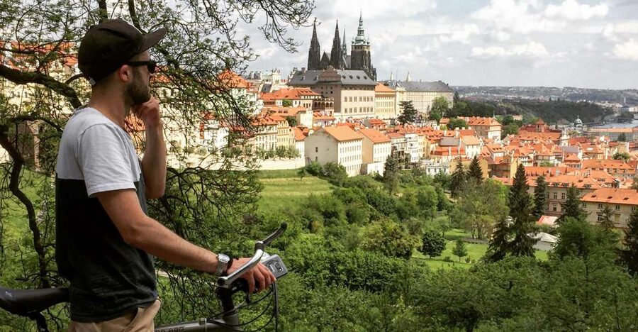 Prague: Stunning Viewpoints, Castle, City & Park E-Bike Tour - What the guide adds to the ride