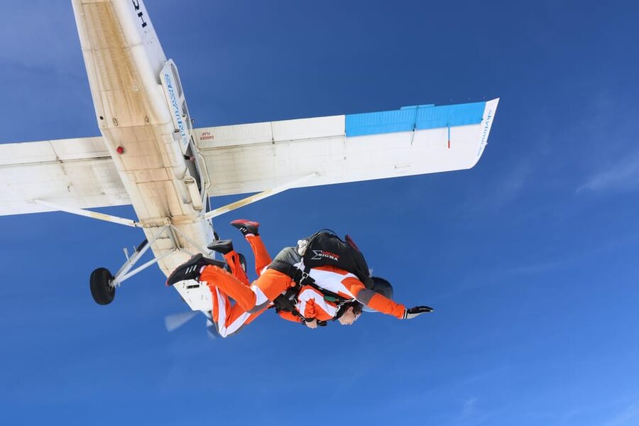 Prague: Tandem Skydiving 14,000ft over Prague with Transfers - Landing, drinks, and the return to Prague