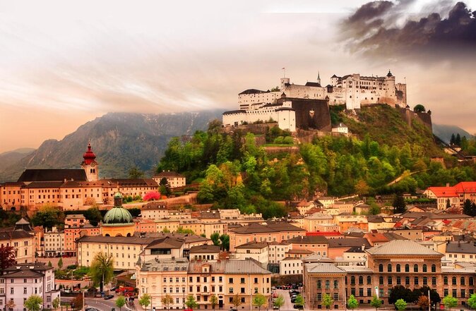 Private Prague to Salzburg luxury car via Cesky Krumlov 5<em> guide – Key details at a glance’ /></p>
<ul>
<li><strong>A private Prague-to-Salzburg transfer:</strong> Your group gets its own vehicle, guide, and pickup in Prague, followed by drop-off at your Salzburg address.</li>
<li><strong>Hluboka Castle exterior stop:</strong> Spend about an hour around the Tudor-style exterior and gardens of this striking chateau. Interior visits are optional.</li>
<li><strong>Budvar in Ceske Budejovice:</strong> Take a short 30-minute stop at the original Budweiser Budvar brewery visitor center, with tasting available as an extra.</li>
<li><strong>Cesky Krumlov castle and old town:</strong> Enjoy about two and a half hours of sightseeing, including the castle area, gardens, historic center, and a medieval-tavern lunch.</li>
<li><strong>Food and drinks included:</strong> The package includes a main dish with a drink, coffee or tea, cake, snacks, and bottled water.</li>
<li><strong>A highly praised guide:</strong> Michal is repeatedly described as courteous, thoughtful, professional, and good company during the long drives.</li>
</ul>
<h2 id="why-use-this-as-your-prague-to-salzburg-transfer">Why use this as your Prague to Salzburg transfer?</h2>
<p><img width="669" height="446" decoding="async" src=