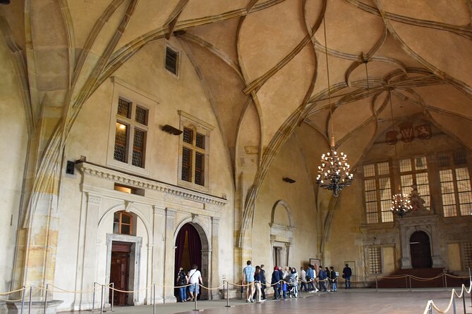 Skip the Line: Prague Castle Ticket and Introductory Overview - St. George’s Basilica offers a quieter contrast