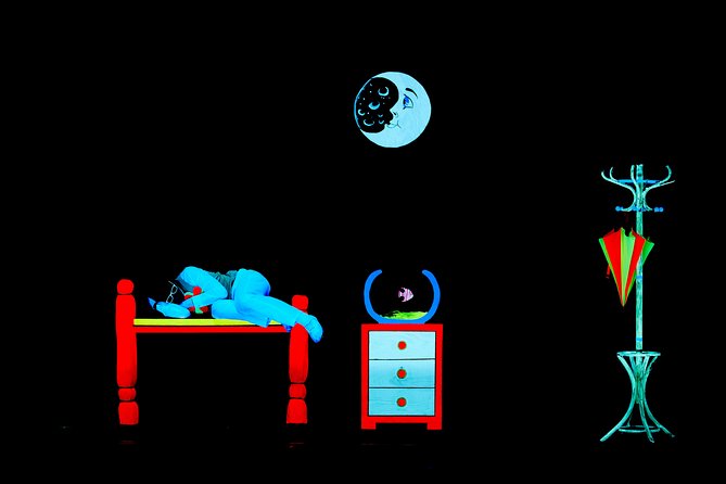 Skip the Line: WOW Show Black Light Theater in Prague Ticket - The opening: black light, music, and visual surprise