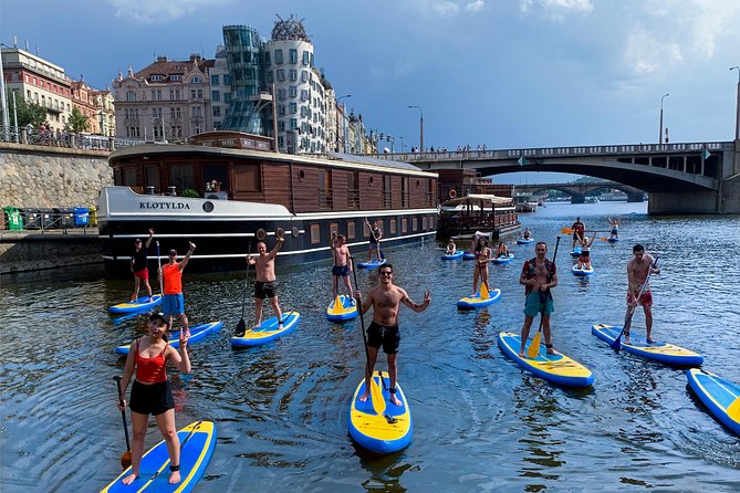 Stand-Up Paddleboarding on the Vltava River in Prague - Paddling from the southern riverfront toward central Prague
