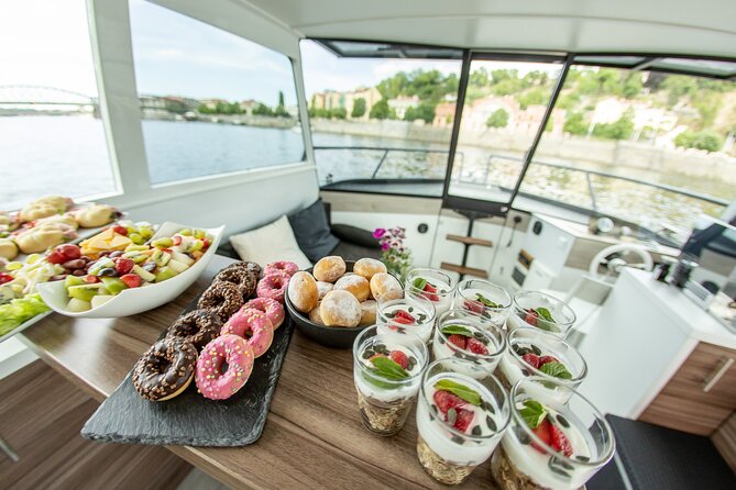 VIP Prague YachtBoat ONE Experience: All-You-Can-Drink - Prague Castle, Vyšehrad, and Old Town from the water